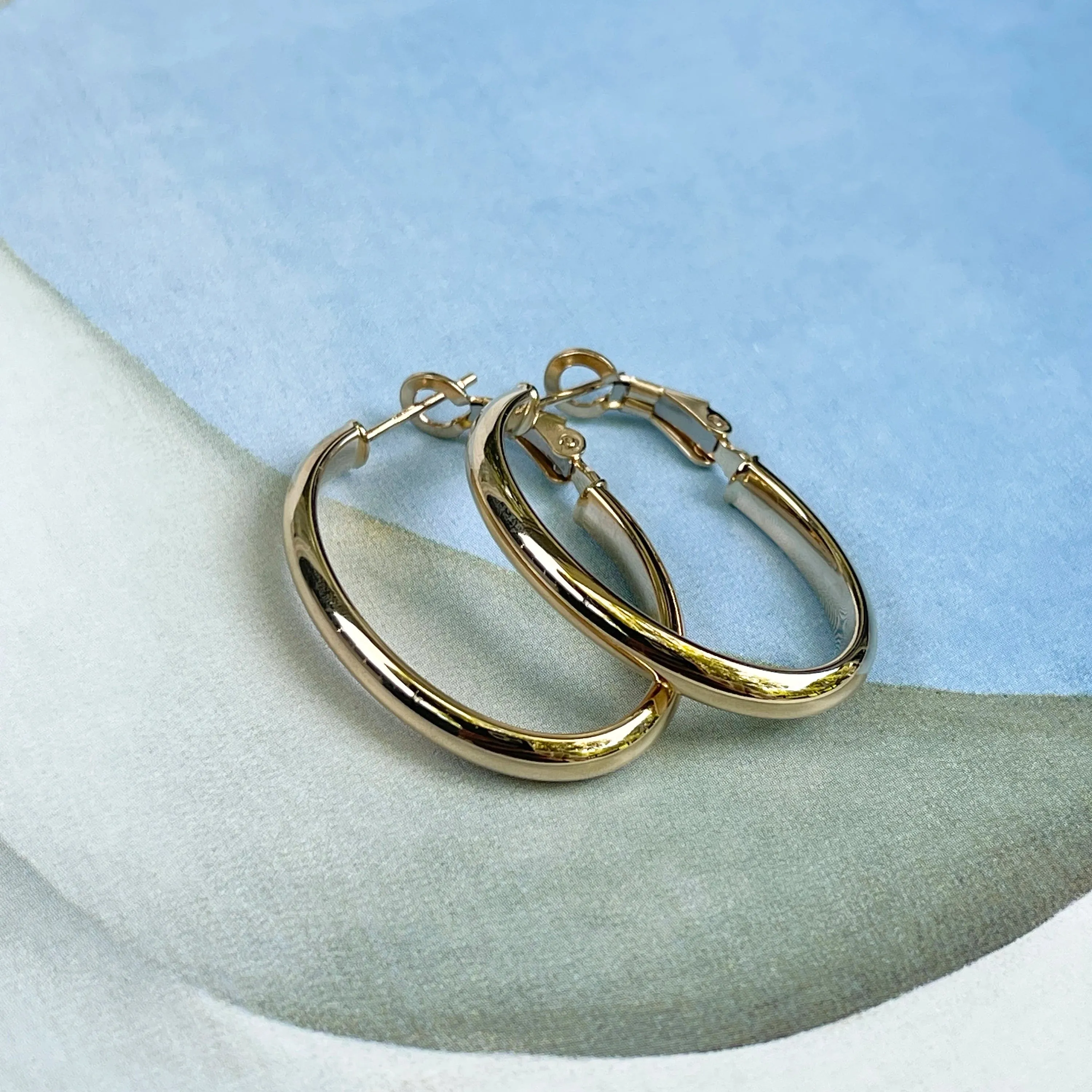 14KT Yellow Gold Oval Hoop Omega Back Earrings 30mm