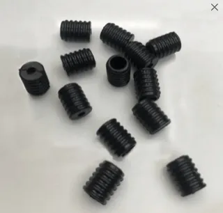 Colored, Black, white or clear silicone beads used as buckles to create adjustable fitting elastic for face masks. Ships from Ohio.